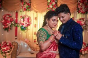 A joyful Indian couple in traditional attire during their wedding ceremony in Chennai.